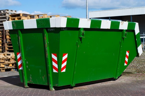 Docklands recycling hub with containers and signage for businesses